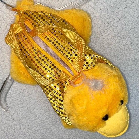 Like-new plush duck tote/backpack, yellow with gold sequins & waterproof pouch - Picture 4 of 6